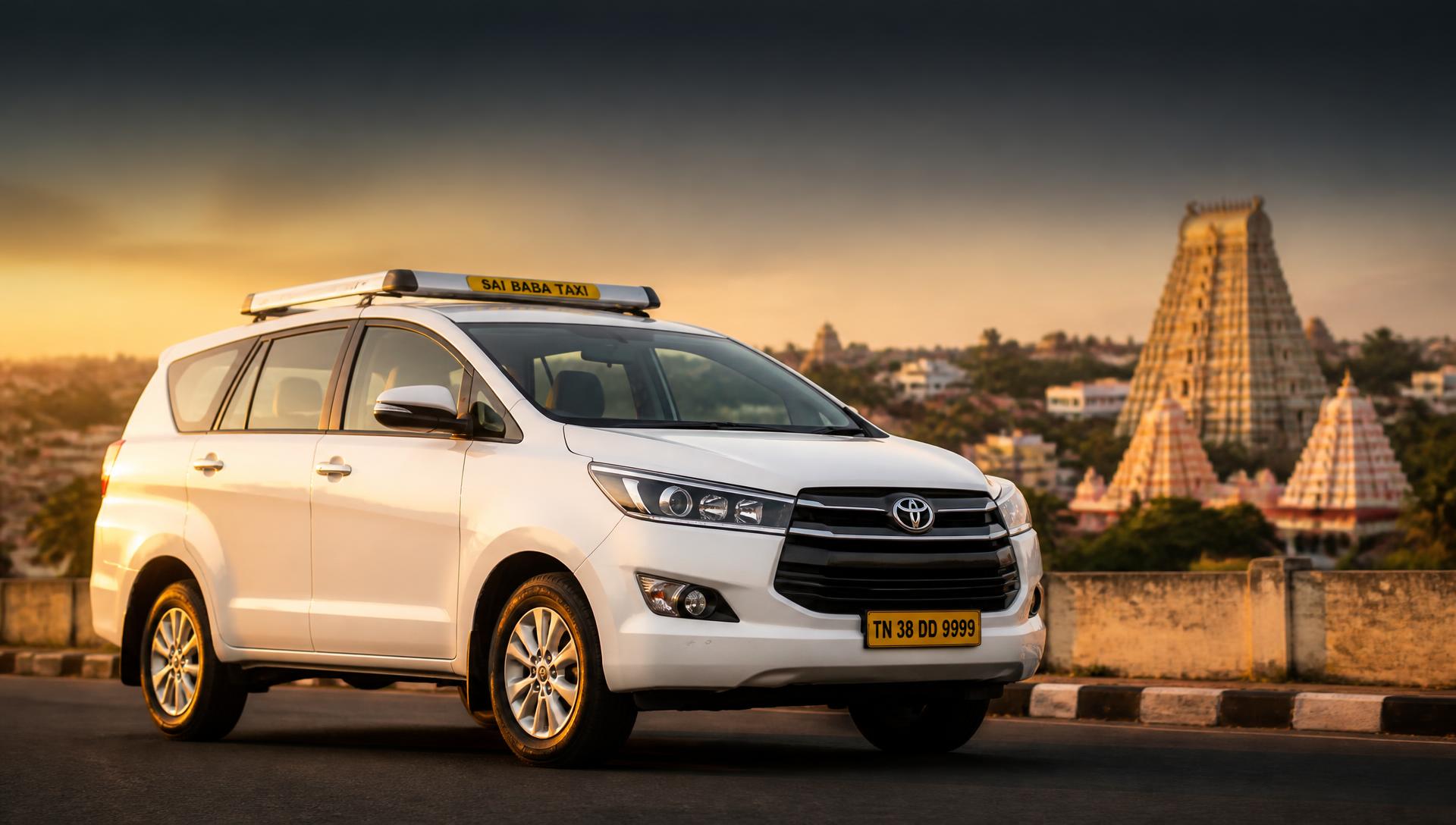 Premium taxi service in Shirdi with a clean white SUV at golden hour